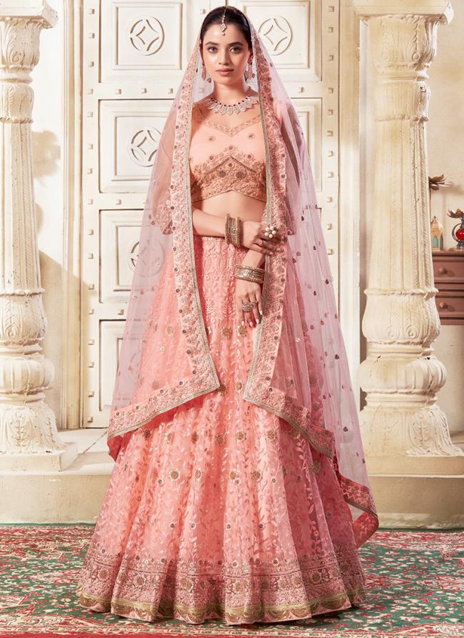 Premium Net Dark Peach Wedding Wear Sequins Work Lehenga Choli